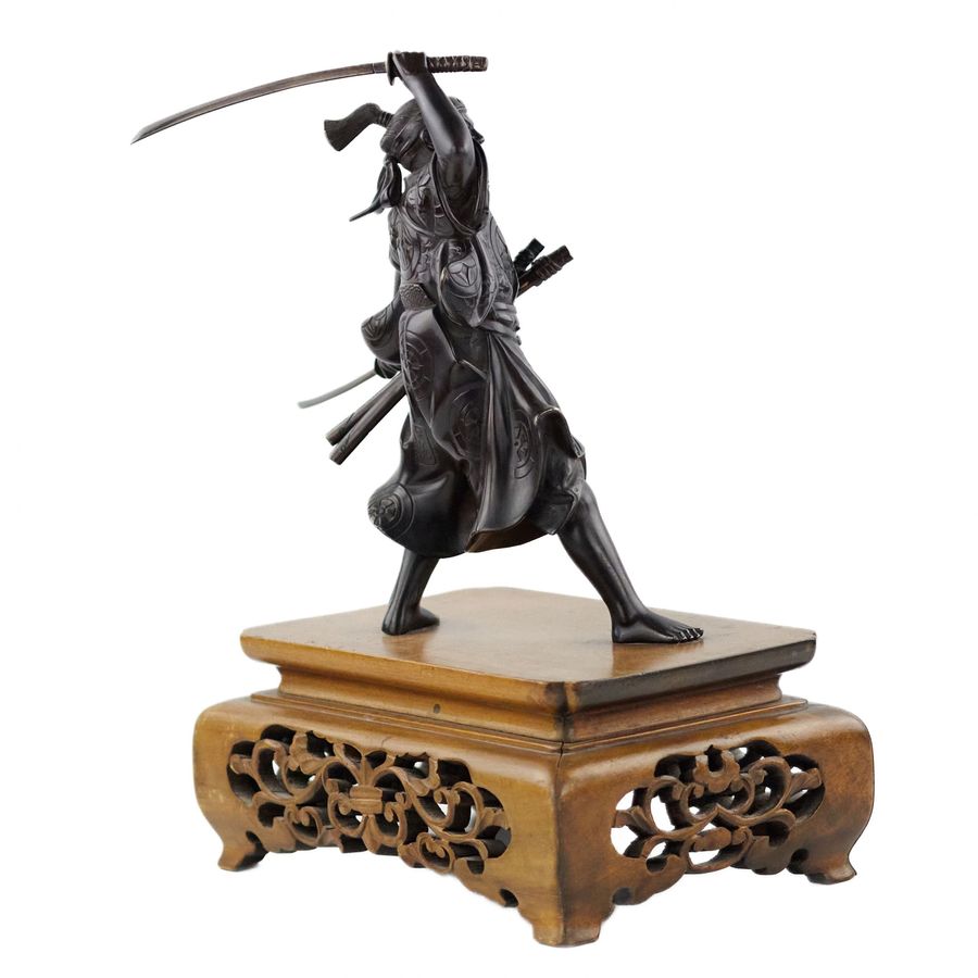 Antique Japanese bronze sculpture of a samurai warrior. Japan. Meiji. The turn of the 19th-20th century.