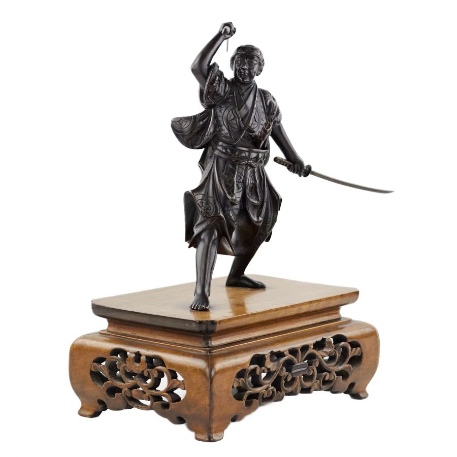 Antique Japanese bronze sculpture of a samurai warrior. Japan. Meiji. The turn of the 19th-20th century.