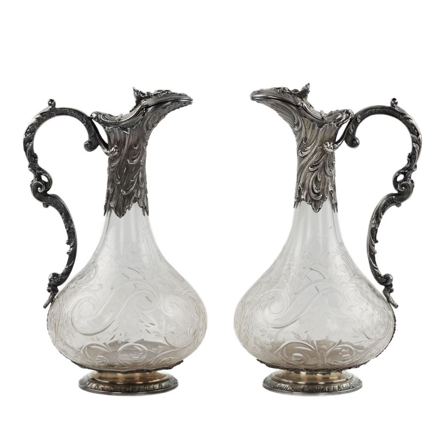 Pair of wine glass jugs in silver, Louis XV style, turn of the 19th-20th centuries.