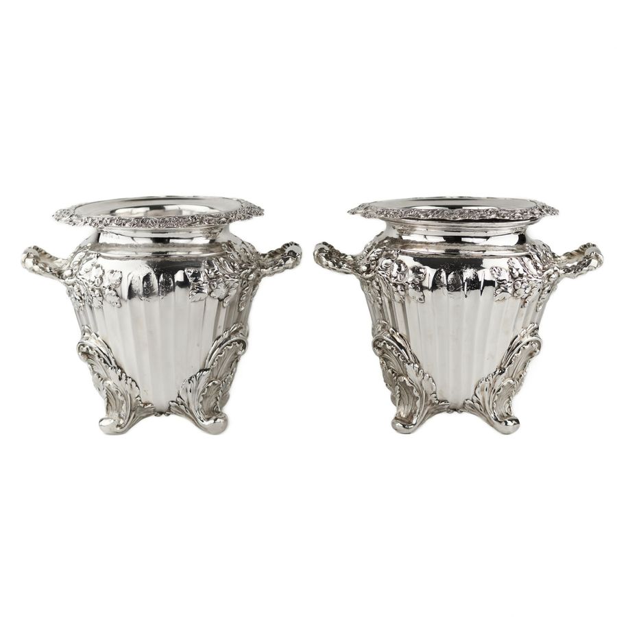 Pair of large, embossed silver wine coolers. England. 1804 Stephen Adams.