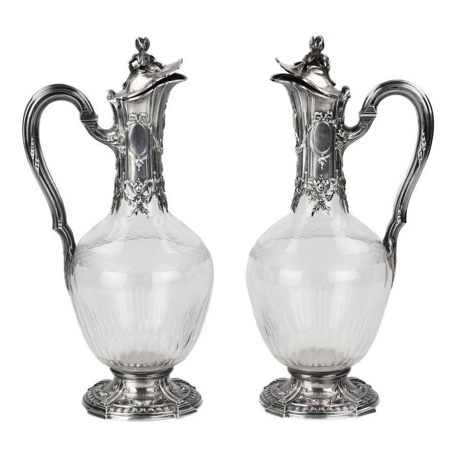 Pair of French glass wine jugs in silver. 19th century.