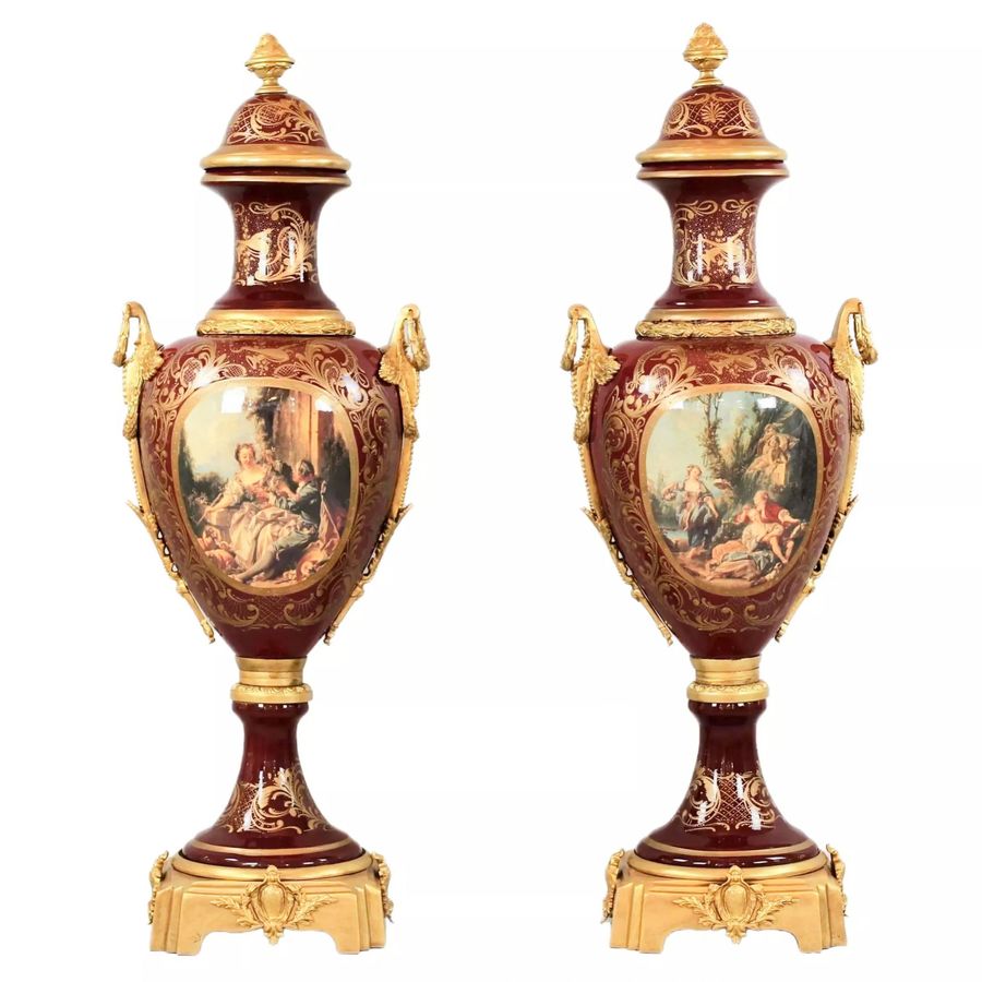 Pair of porcelain floor vases with gilt bronze in the Louis XVI style. France. 1920 th century.