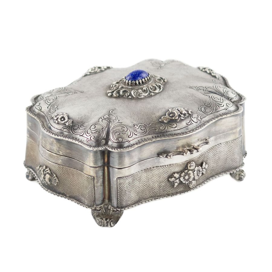 Italian, silver jewelry box of baroque shape.