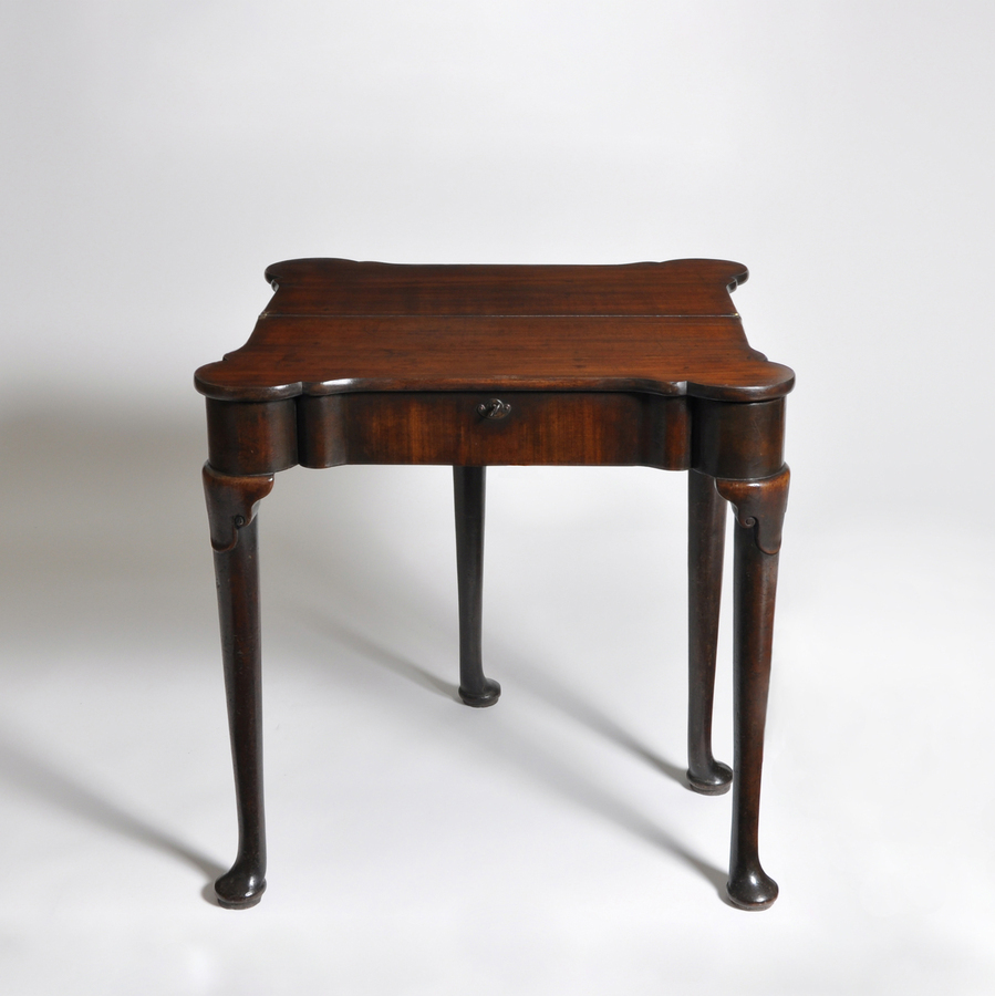 Antique A George II Mahogany Tea Table of small proportions.