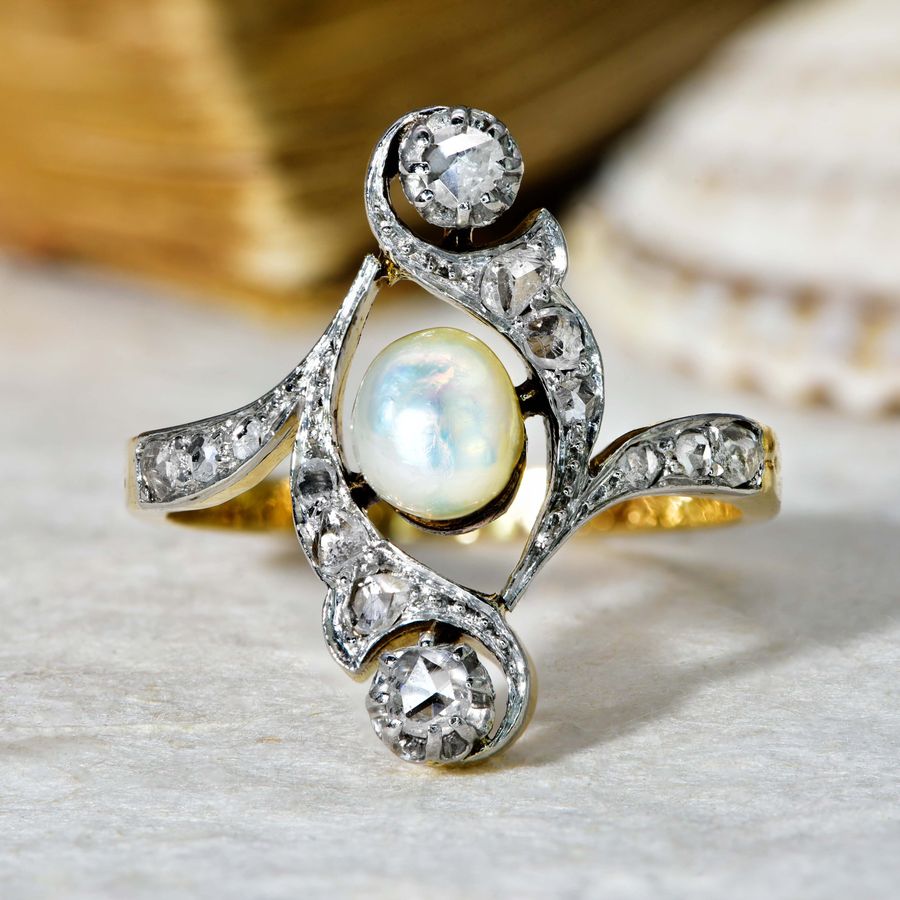 The Antique 1917 Baroque Pearl and Old Cut Diamond Elaborate Ring