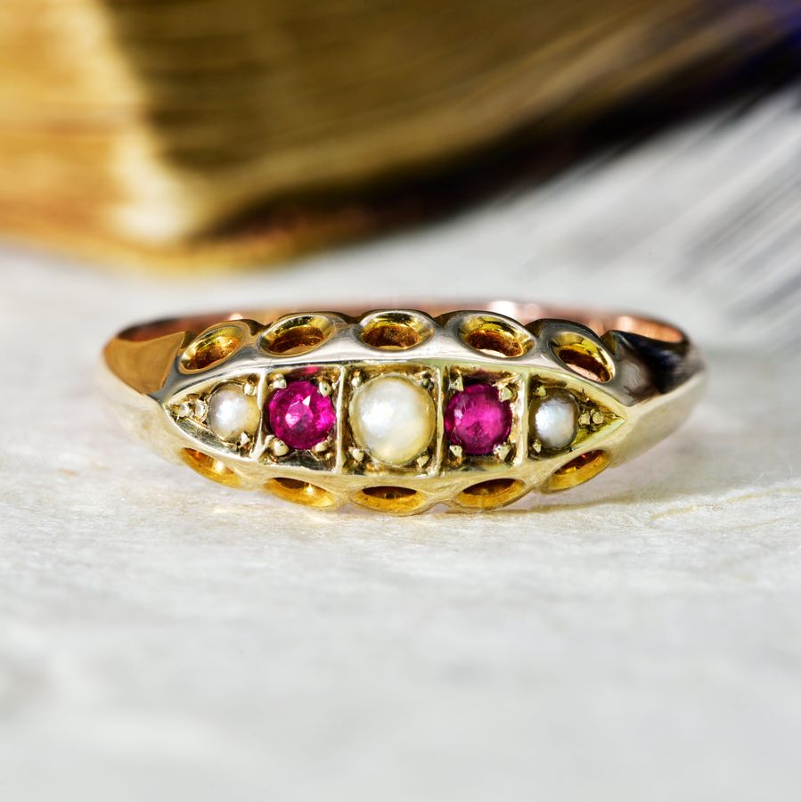 The Antique 1911 Pearl and Ruby Boat Ring