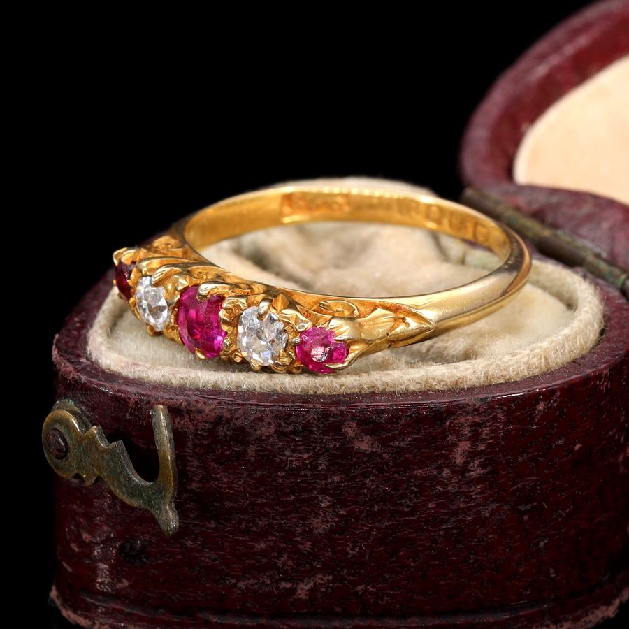 Antique The Antique 1915 Ruby and Diamond Scroll Ring