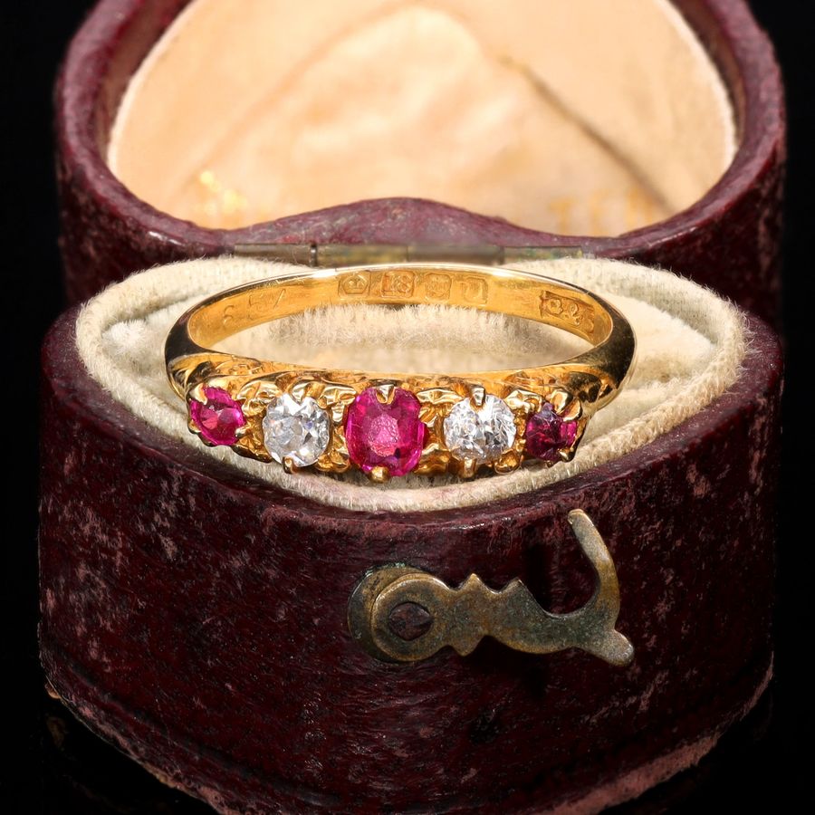 Antique The Antique 1915 Ruby and Diamond Scroll Ring