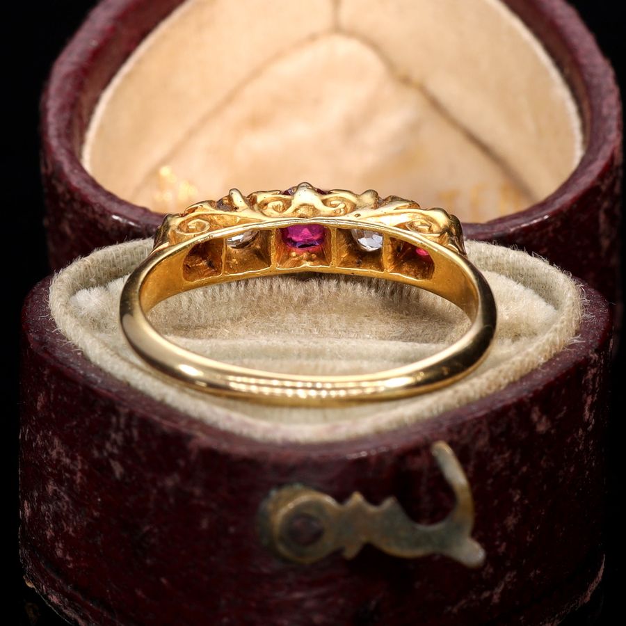 Antique The Antique 1915 Ruby and Diamond Scroll Ring