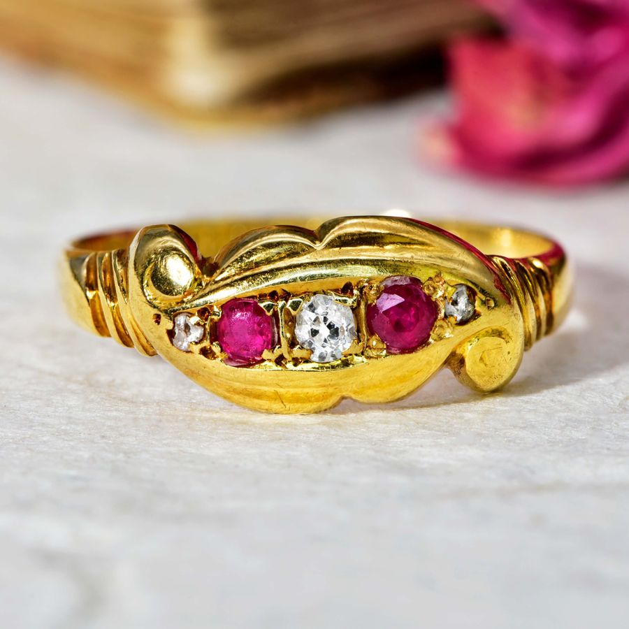 The Antique 1919 Diamond and Ruby Scroll Ring