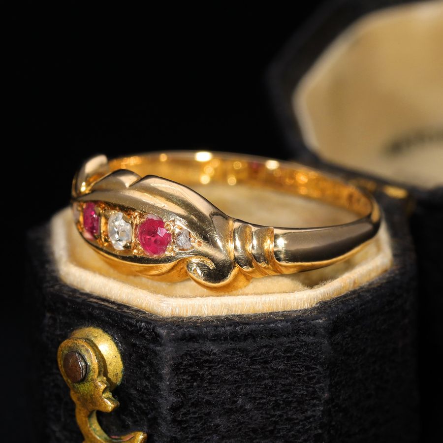 Antique The Antique 1919 Diamond and Ruby Scroll Ring