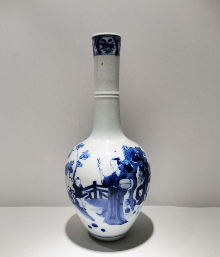 Blue and white vase with figures