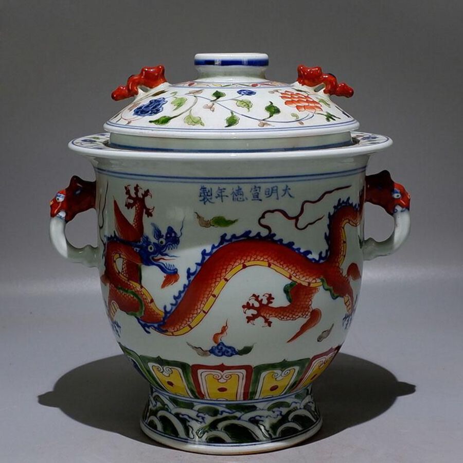 Blue and white glaze covered jar with dragons