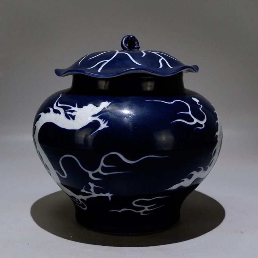 Blue-glazed lotus leaf lidded jar with dragon motif