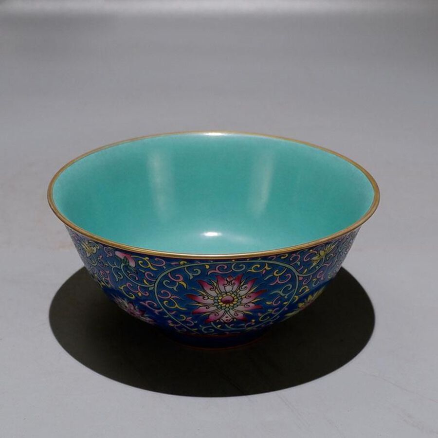 Enamelled blue bowl with lotus flower pattern