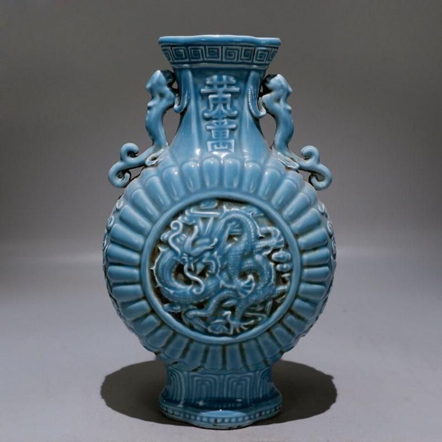 Double-ear vase with dragon pattern and azure glaze