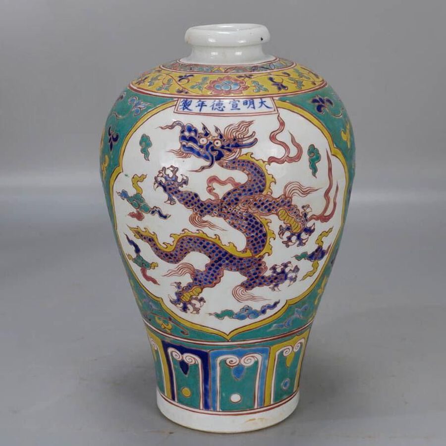 Enameled open-window plum vase with dragon pattern