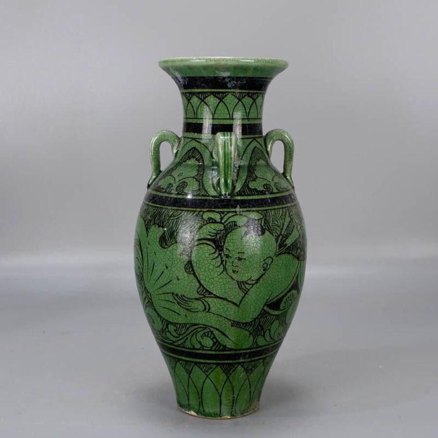 Green-glazed vase with four lines of baby play