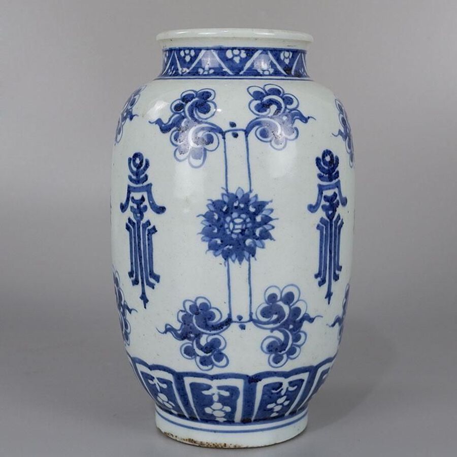 blue-glazed floral vase with longevity motif