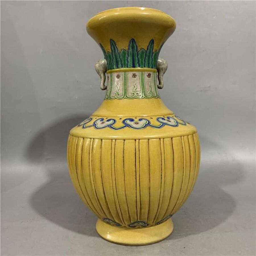 Yellow glazed vase with elephant ears