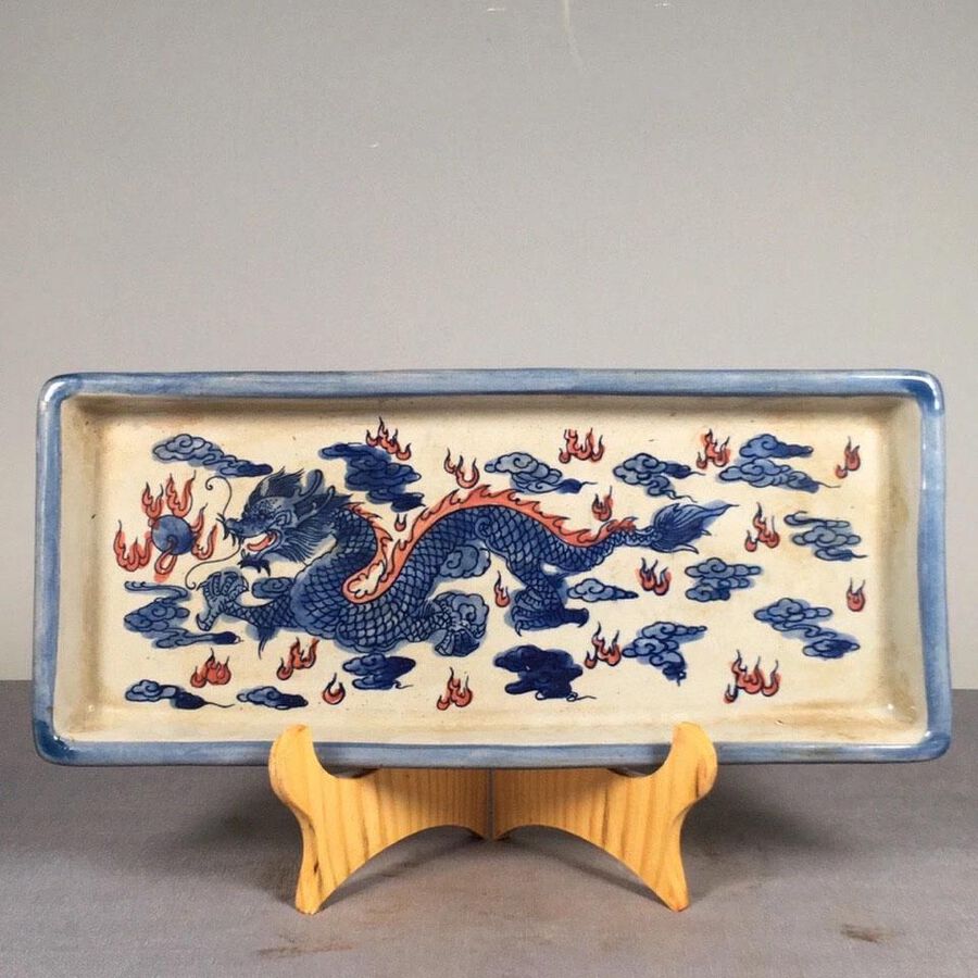 Blue and white tea plate with dragon pattern