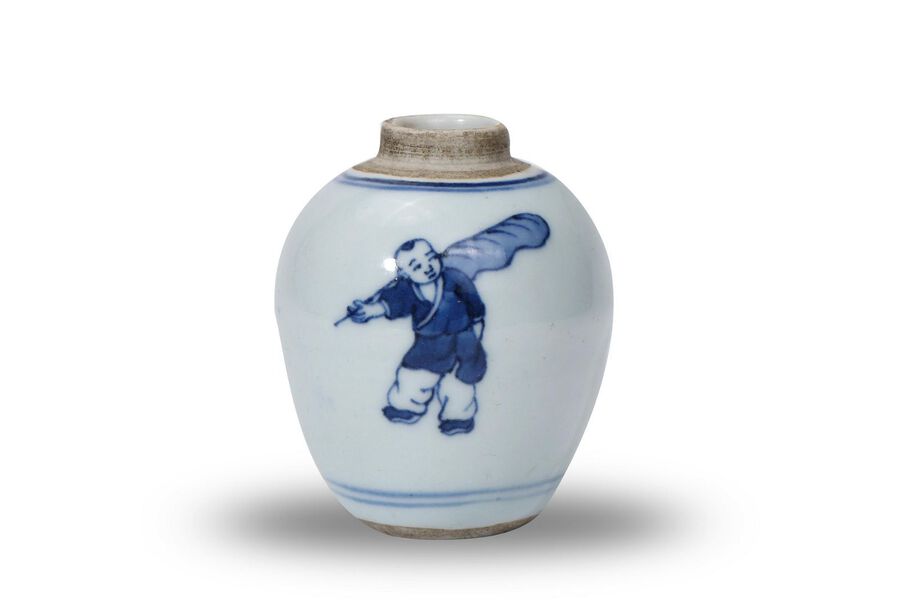 Blue and white jar with child