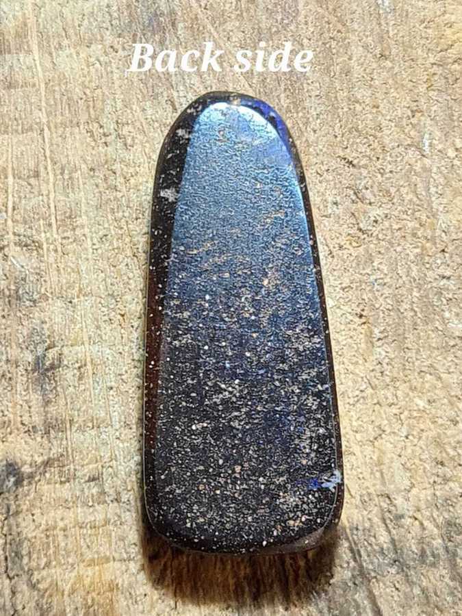 Violetish blue with play of colors,black opal in matrix - 6.42 ct