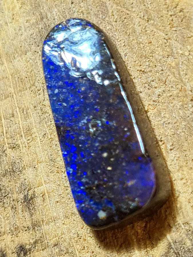 Antique Violetish blue with play of colors,black opal in matrix - 6.42 ct