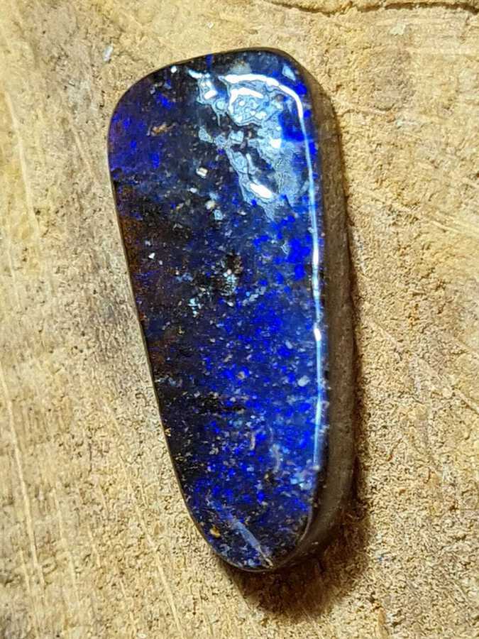 Antique Violetish blue with play of colors,black opal in matrix - 6.42 ct