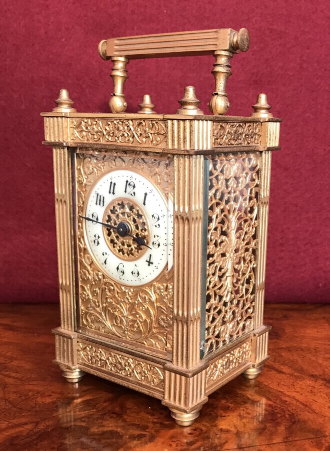 Antique Carriage Clock With Filigree Mask And Side Panels Circa 1900