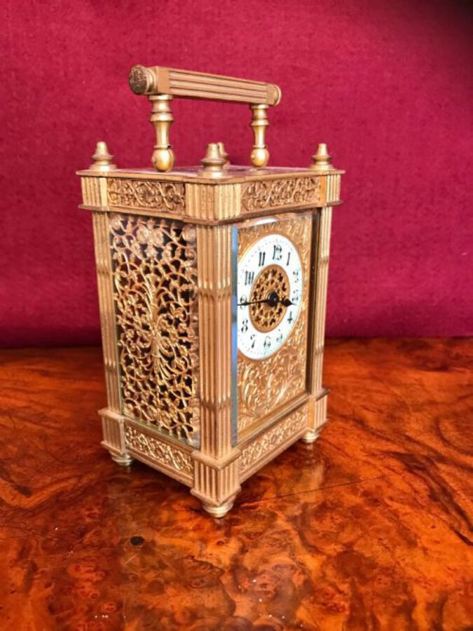 Antique Carriage Clock With Filigree Mask And Side Panels Circa 1900