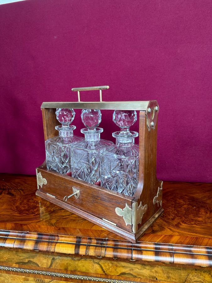 Antique Tantalus with 3 decanters circa 1920