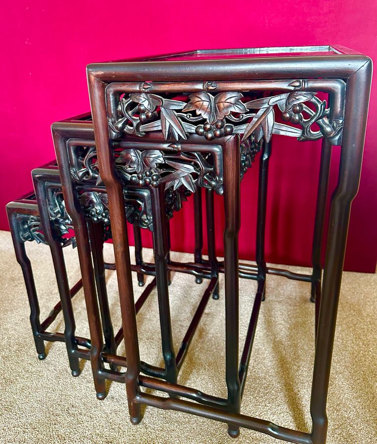 Antique A nest of 4 Chinese Padouk tables