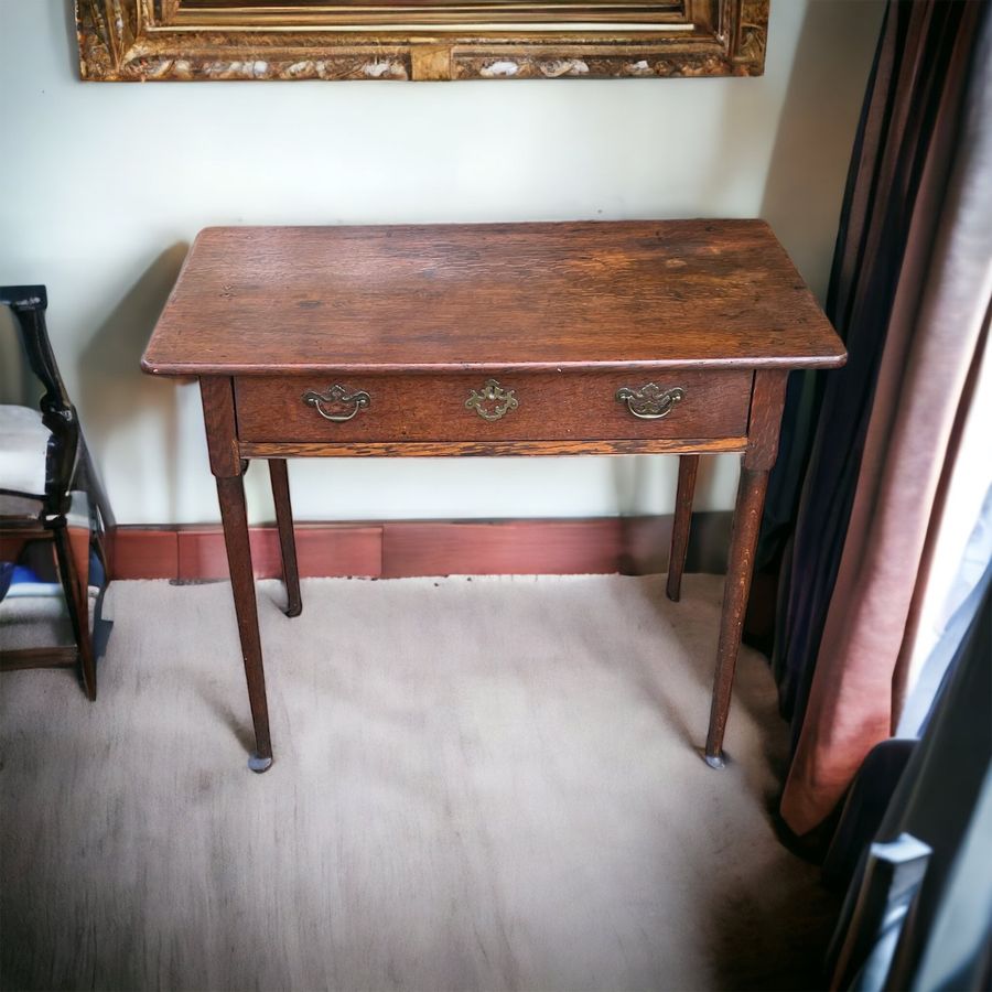 Antique 18th century English  oak table on pad feet