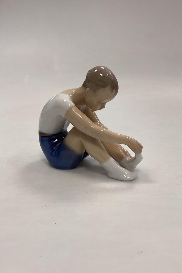 Antique Bing and Grondahl Figurine Boy takes off sock No. 2199