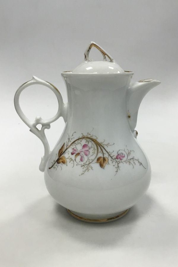 Antique Bing & Grondahl White porcelain coffee pot with flower decoration and gold. Measures 22 cm (8 21/32 in.)
