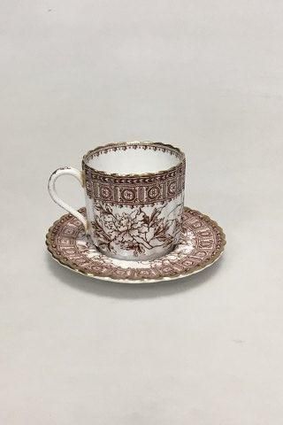 Antique British Copeland cup and saucer with gilt rim.