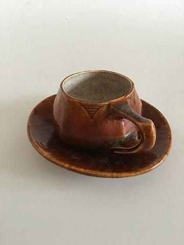Antique Emile Decaeur cup and saucer. Cup measures 2 1/4