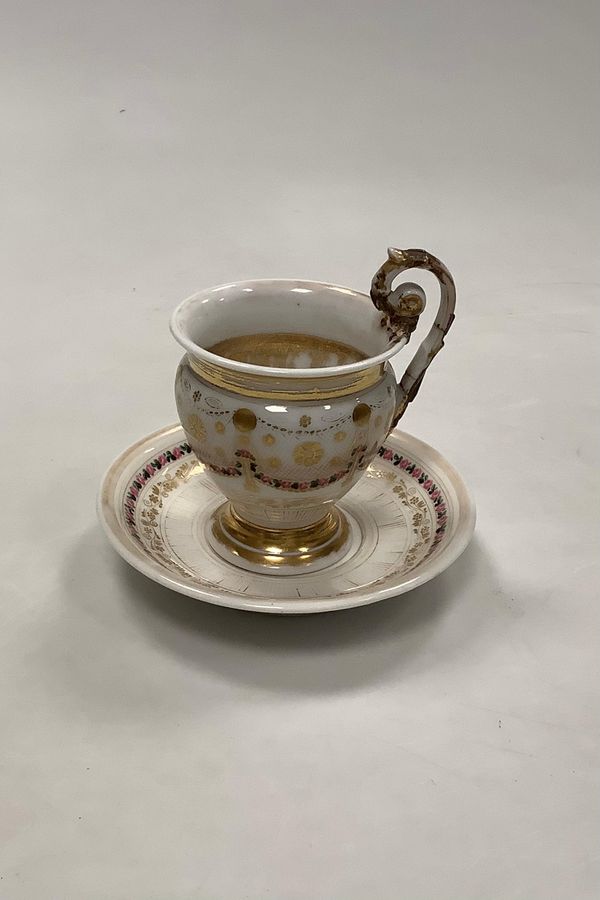 Antique Old cup and saucer with decoration with flower guillander and gold