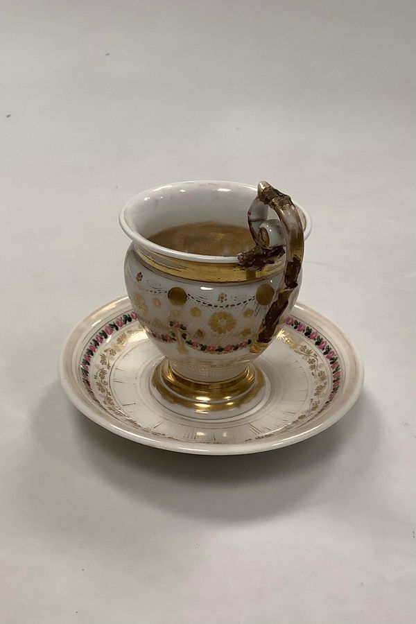 Antique Old cup and saucer with decoration with flower guillander and gold