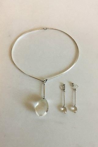 Antique Georg Jensen Sterling Silver Set consisting of Necklace No 114 with Pendant of Rutil Quartz No 131 and associated Earrings with Screw lock. Designed by Vivianna Torun Bülow-Hübe