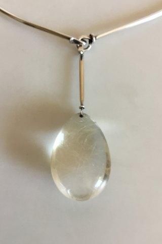 Antique Georg Jensen Sterling Silver Set consisting of Necklace No 114 with Pendant of Rutil Quartz No 131 and associated Earrings with Screw lock. Designed by Vivianna Torun Bülow-Hübe