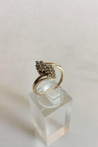 Antique Gold ring in 14K with 16 small stones