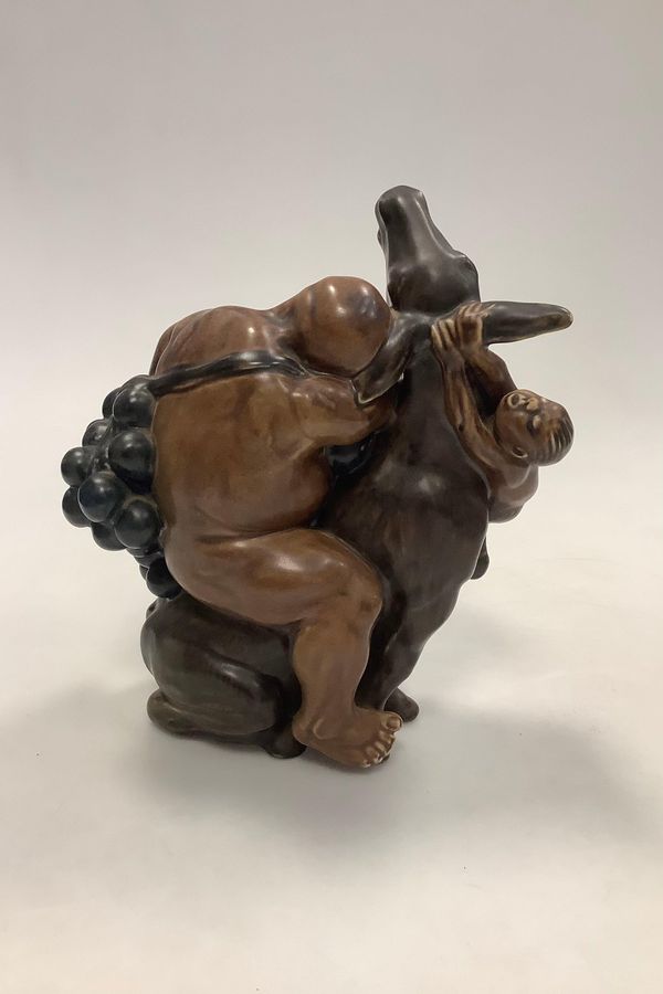 Antique Kai Nielsen Stoneware figurine no. 4026 Sleeping Bacchus and climbing Faun on Aesculus