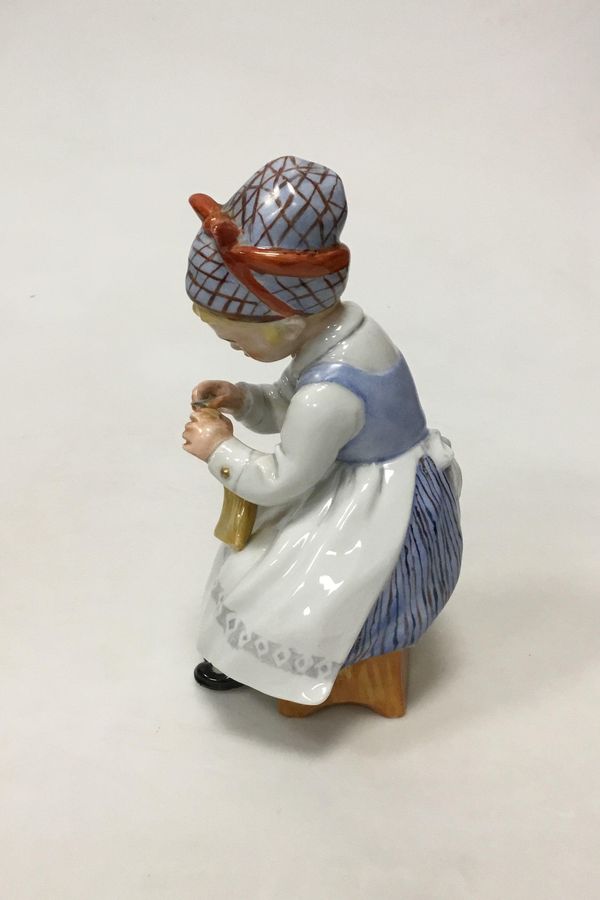 Antique Lippelsdorf porcelain figurine of a woman crocheting