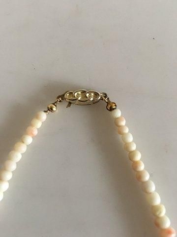 Antique Pearl Necklace with Ivory and Lock of Gilded Sterling Silver