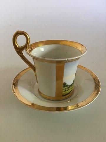Antique Royal Copenhagen Empire Cup with motif of Eremitagen from 1820-1850.
