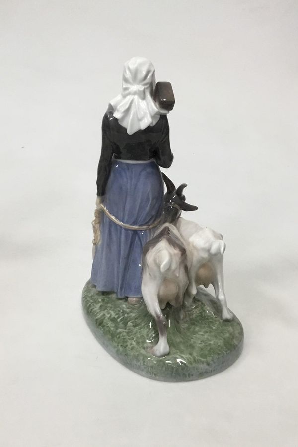 Antique Royal Copenhagen Figurine of Woman with goats No 694
