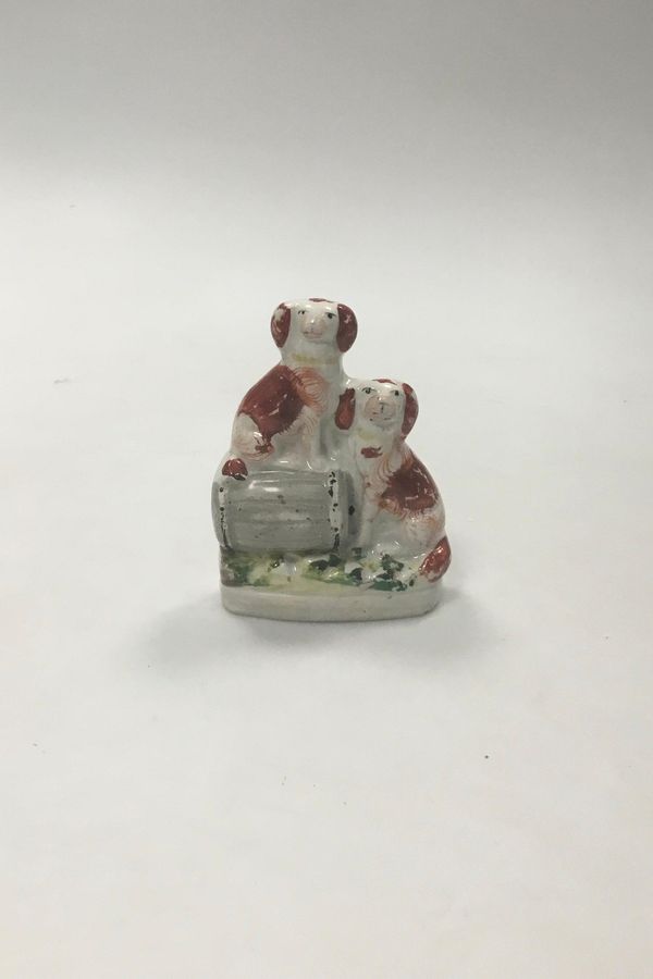 Staffordshire(?) Faience Figurine. Two dogs on a barrel