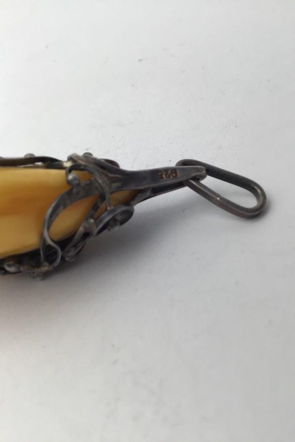 Antique Sterling Silver Pendant with Amber